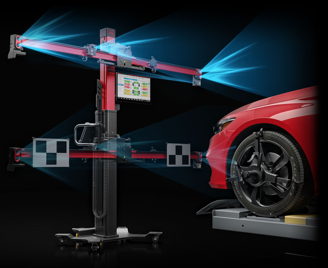 Professional ADAS calibration equipment with precision target boards and laser alignment tools in a workshop setting